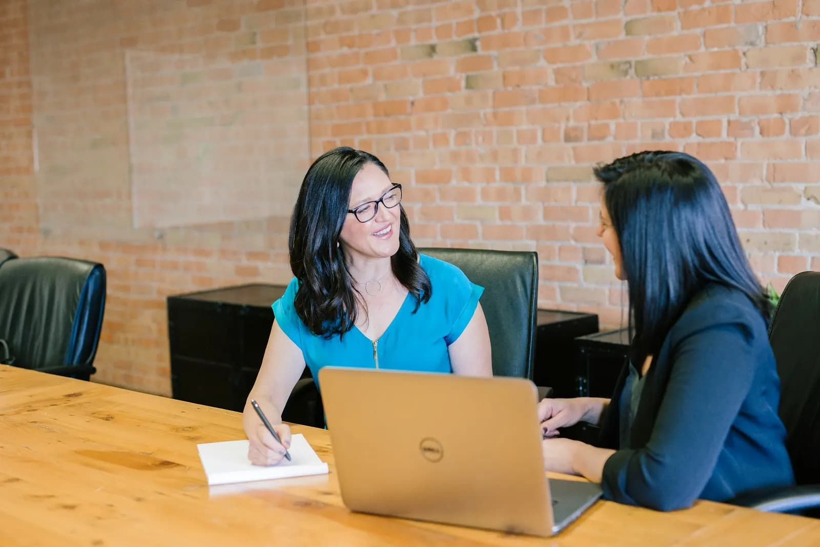 Finance professionals working on confidential client files